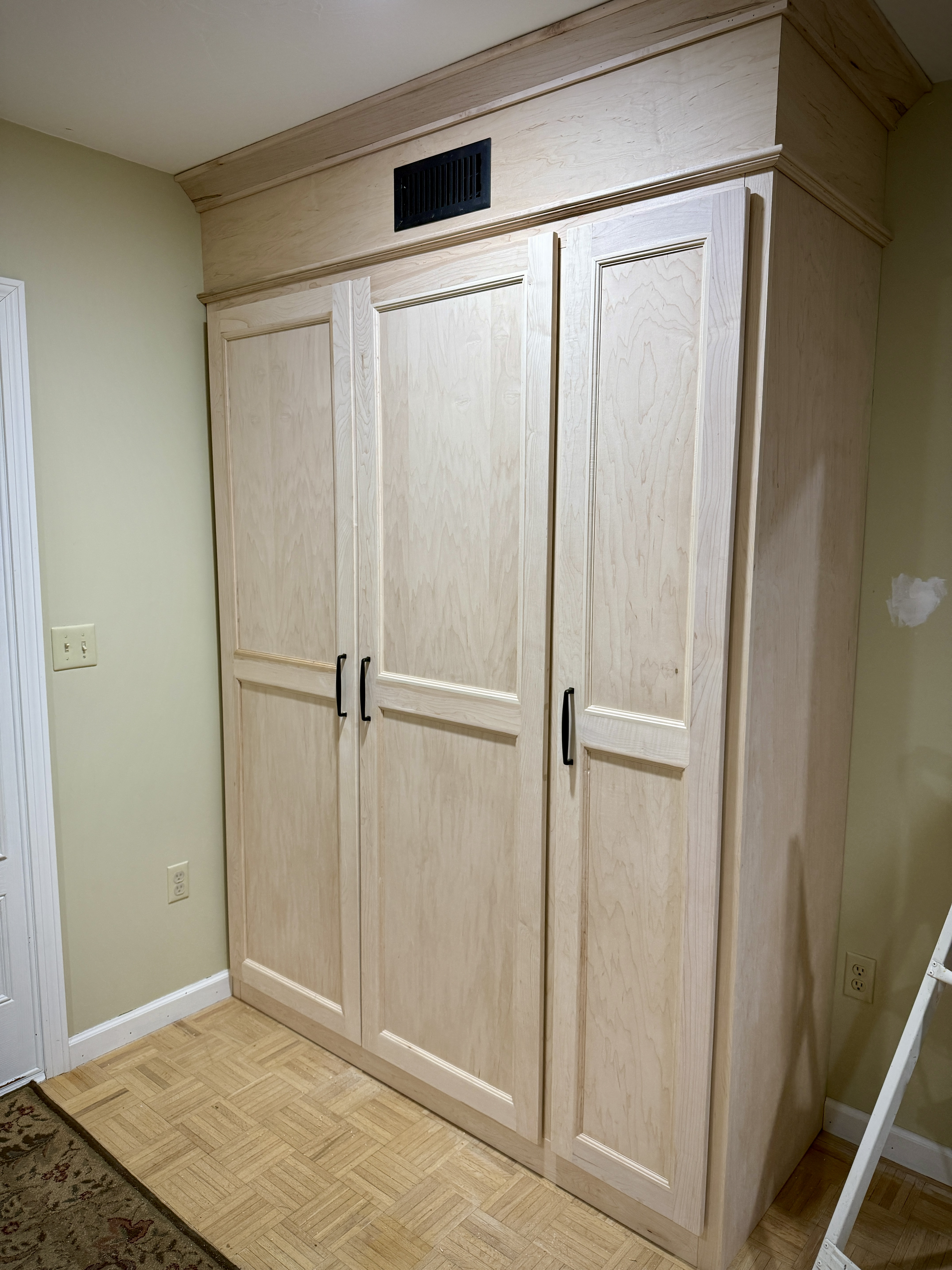Maple built-in entry closet and wardrobe storage in East Greenwich, RI